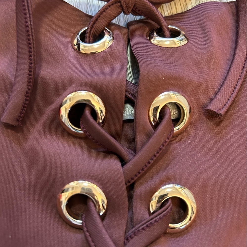 CHARLOTTE RUSSE burgundy one piece lace up bodysuit. New condition. Bottom snaps - Picture 4 of 6
